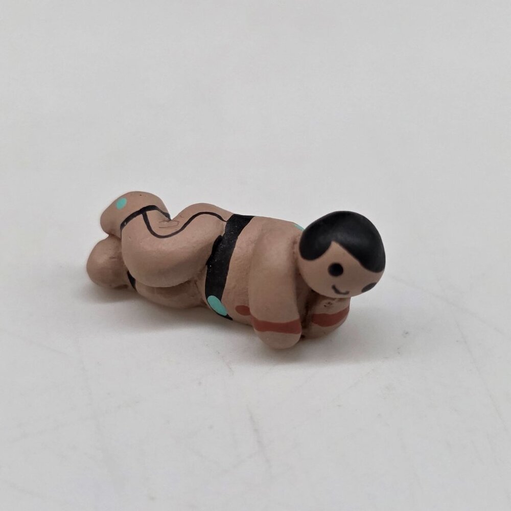 Handcrafted Navajo Southwestern Clay Figurine Reclining Man With Black Hair